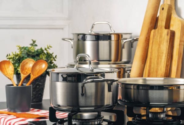 Clean saucepan on a gas stove in kitchen. Close up.